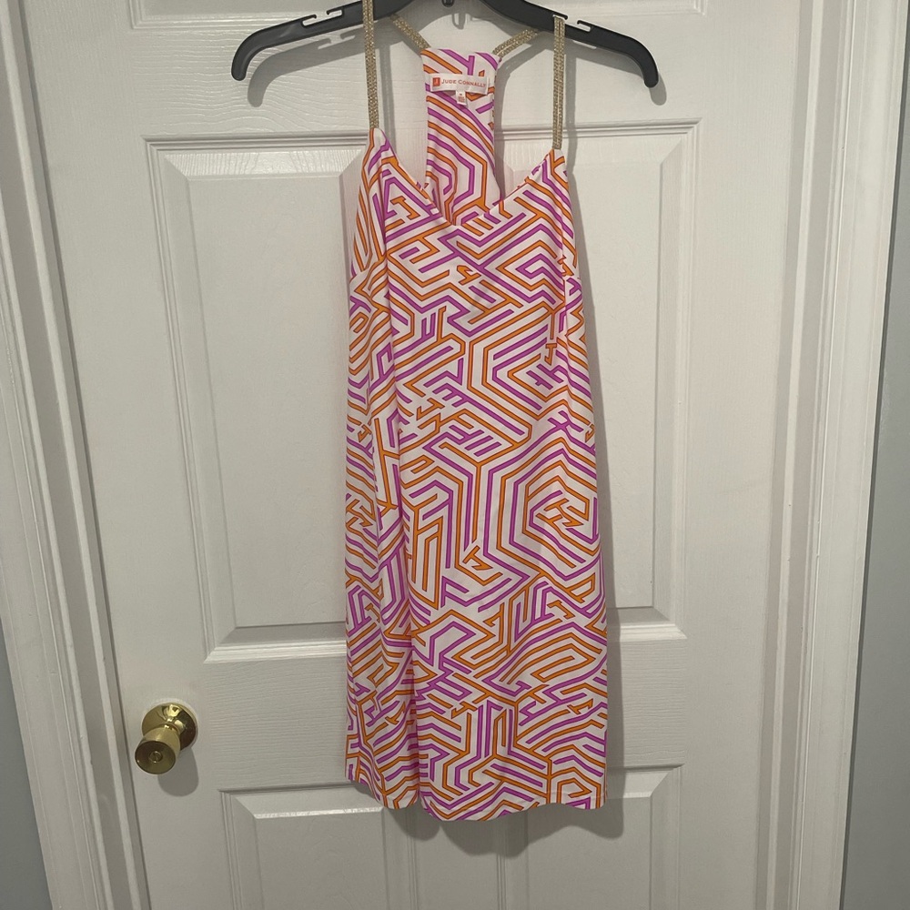 Jude Connally orange and purple cocktail dress.